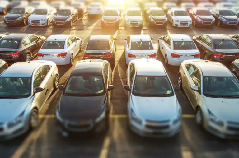 Cars in a dealership car park